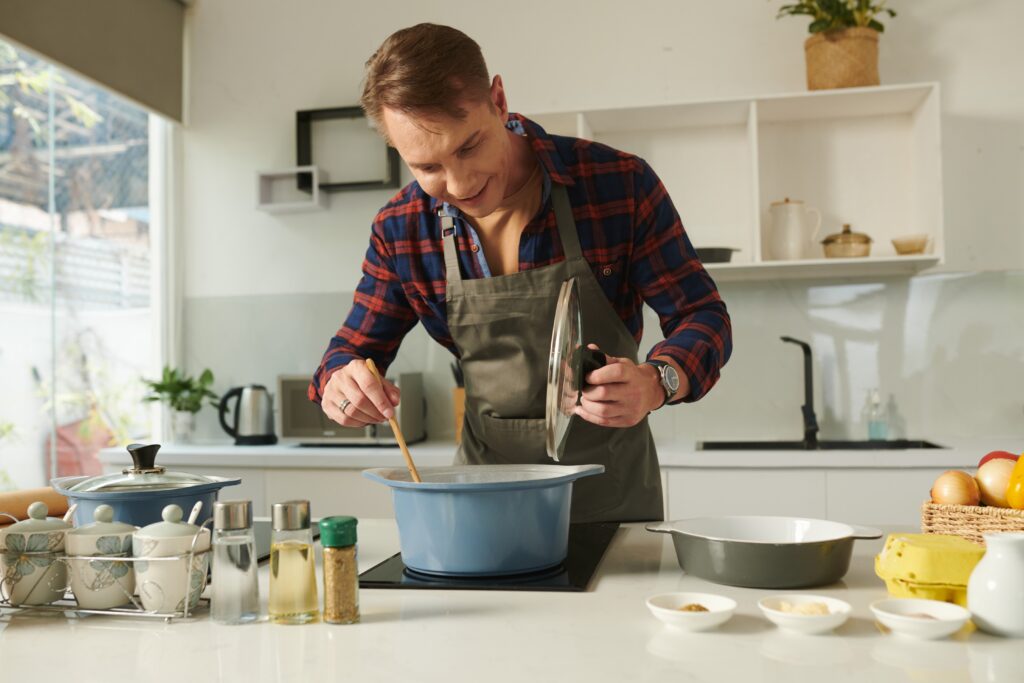 Man preparing healthy soup